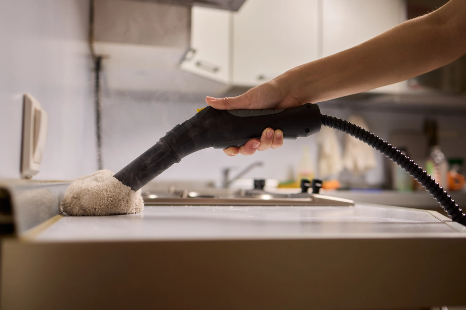 steam cleaning an apartment kitchen counter in Nashville TN