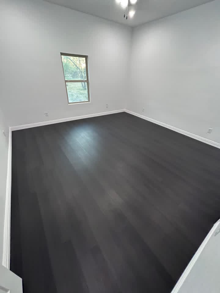 Finished drywall and paint in a clean bedroom