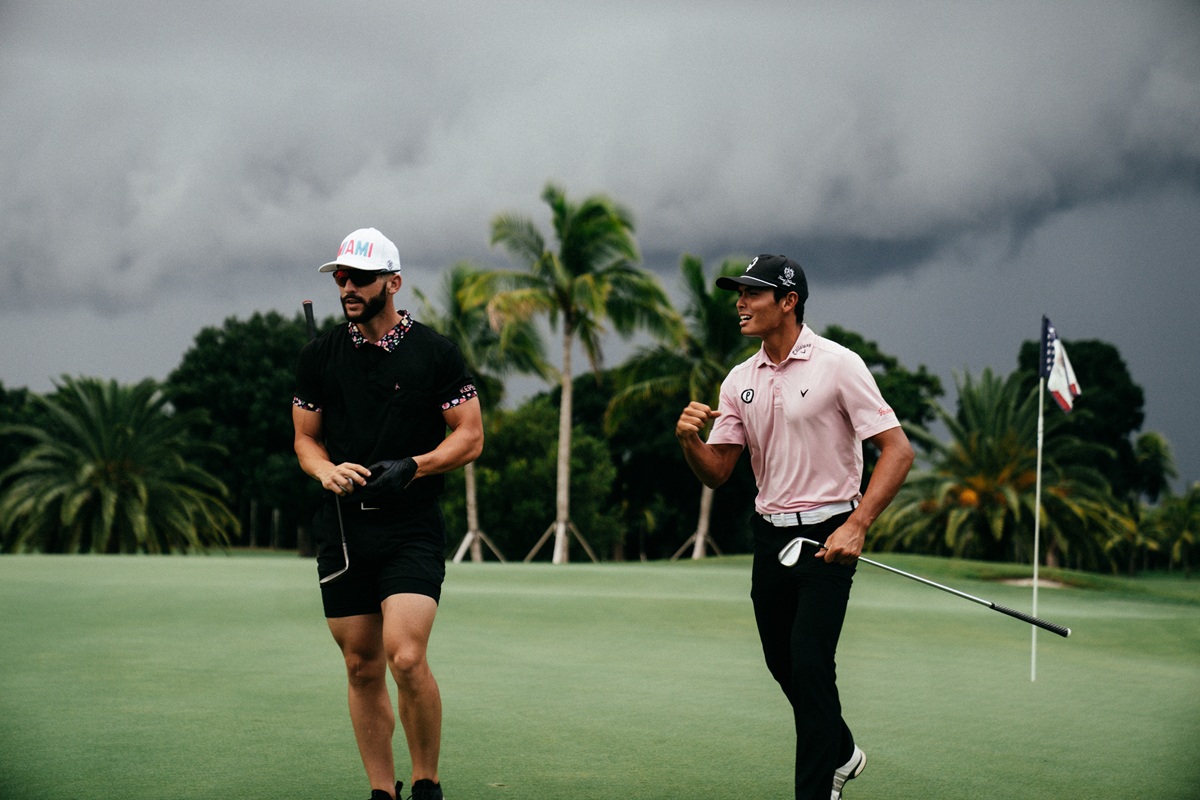 Two golfers evaluating a shot together