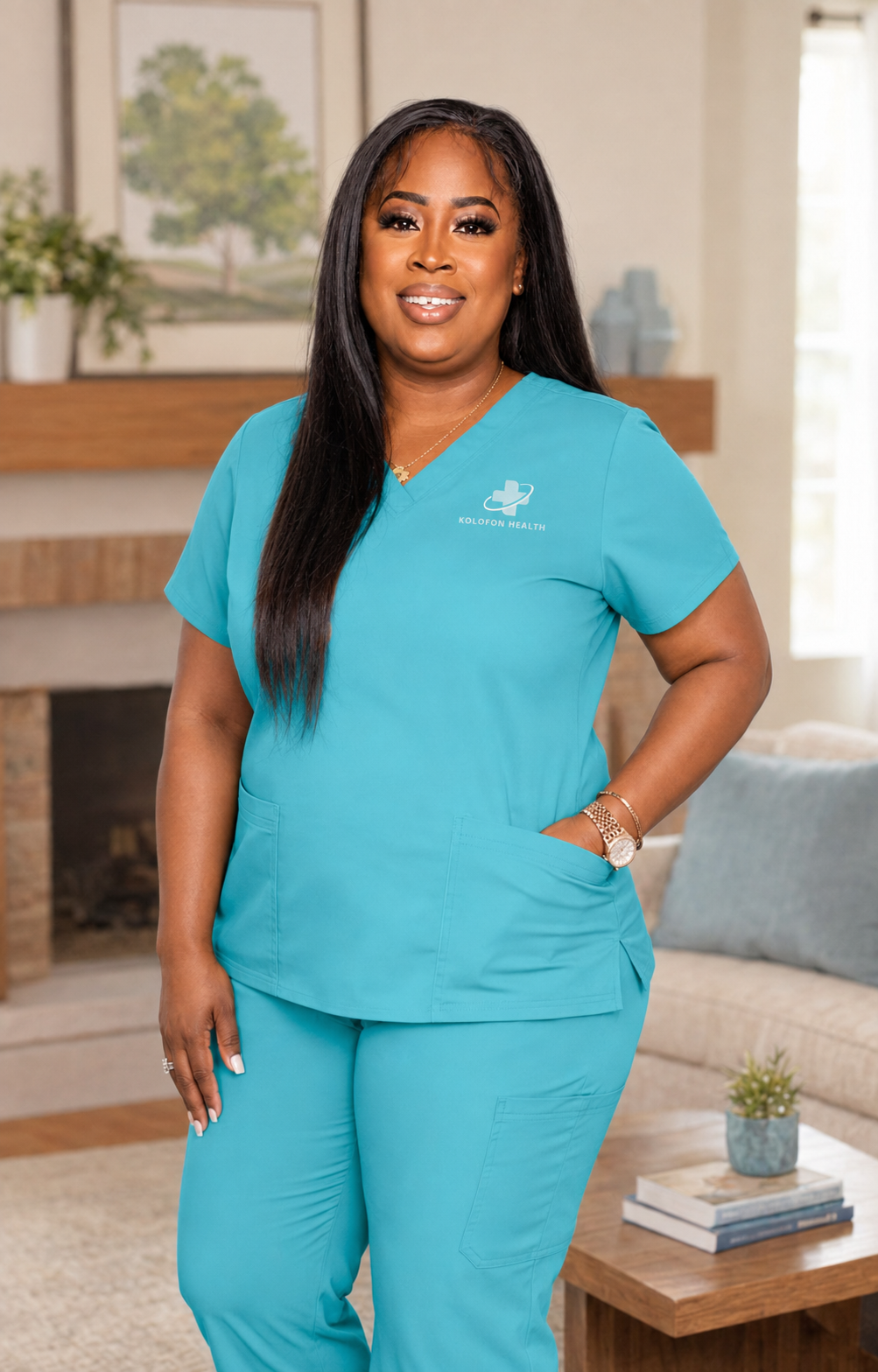 Natasha Ajeti, RN, founder of Kolofon Health, in teal scrubs