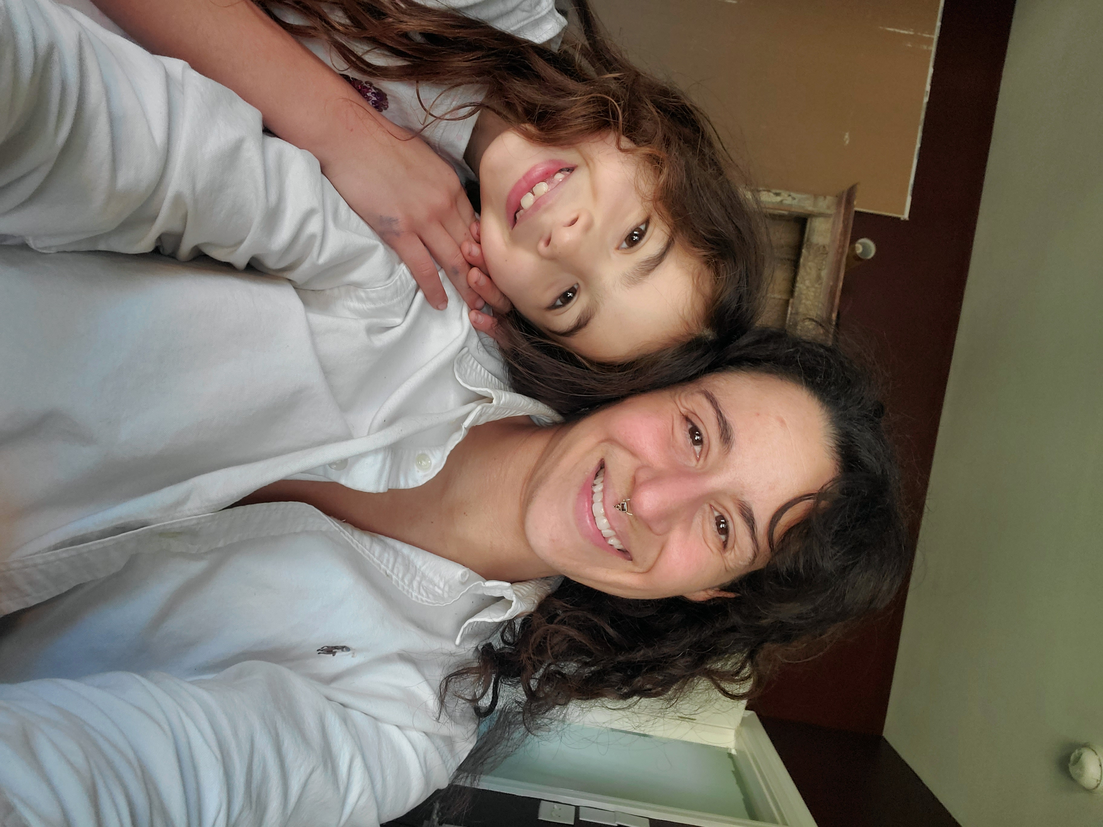 Melodie and her daughter Rosa smiling together
