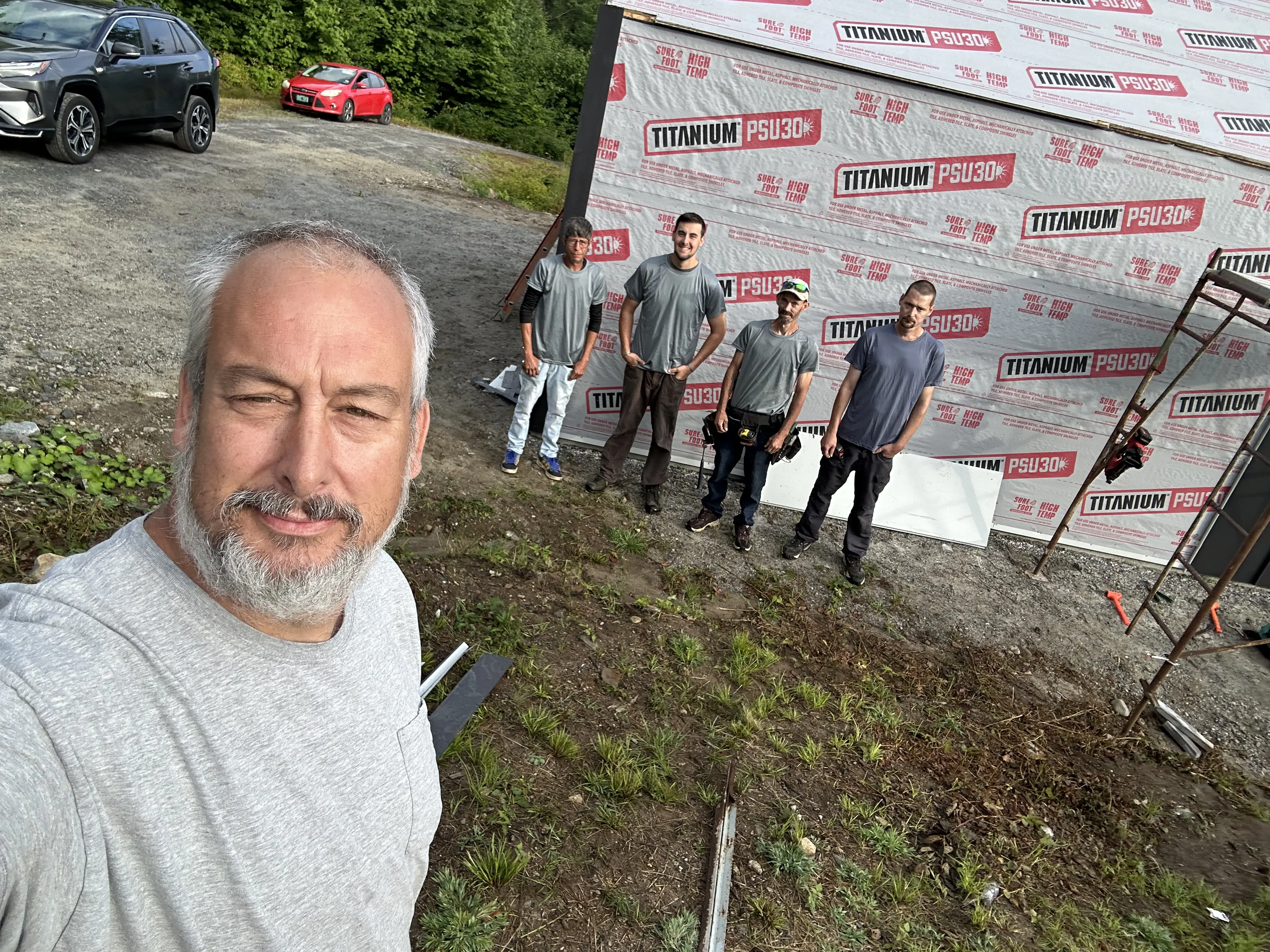 Heritage crew working on a slate roof