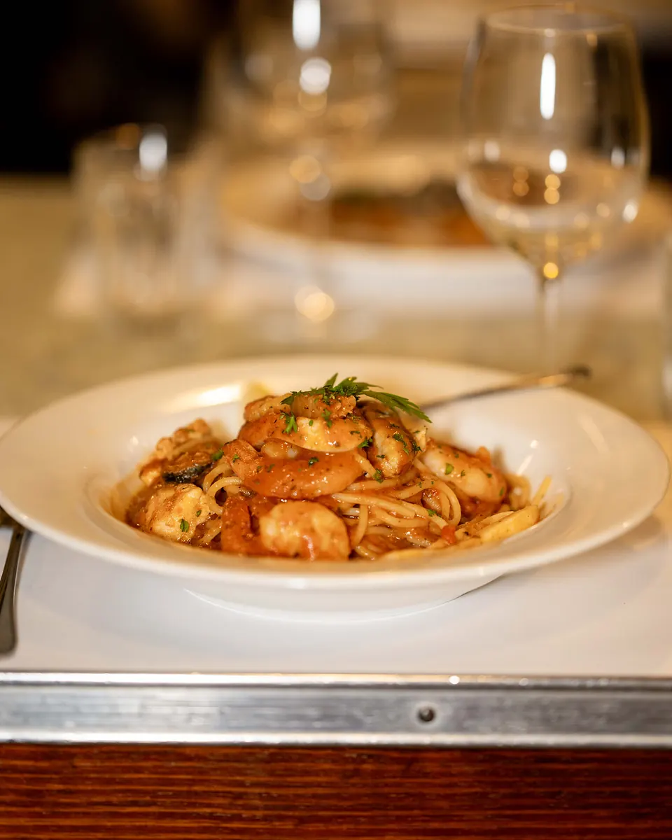 Grappino's Marinara: spaghetti with prawns, scallops, mussels and calamari in Napoli sauce and cream of lobster