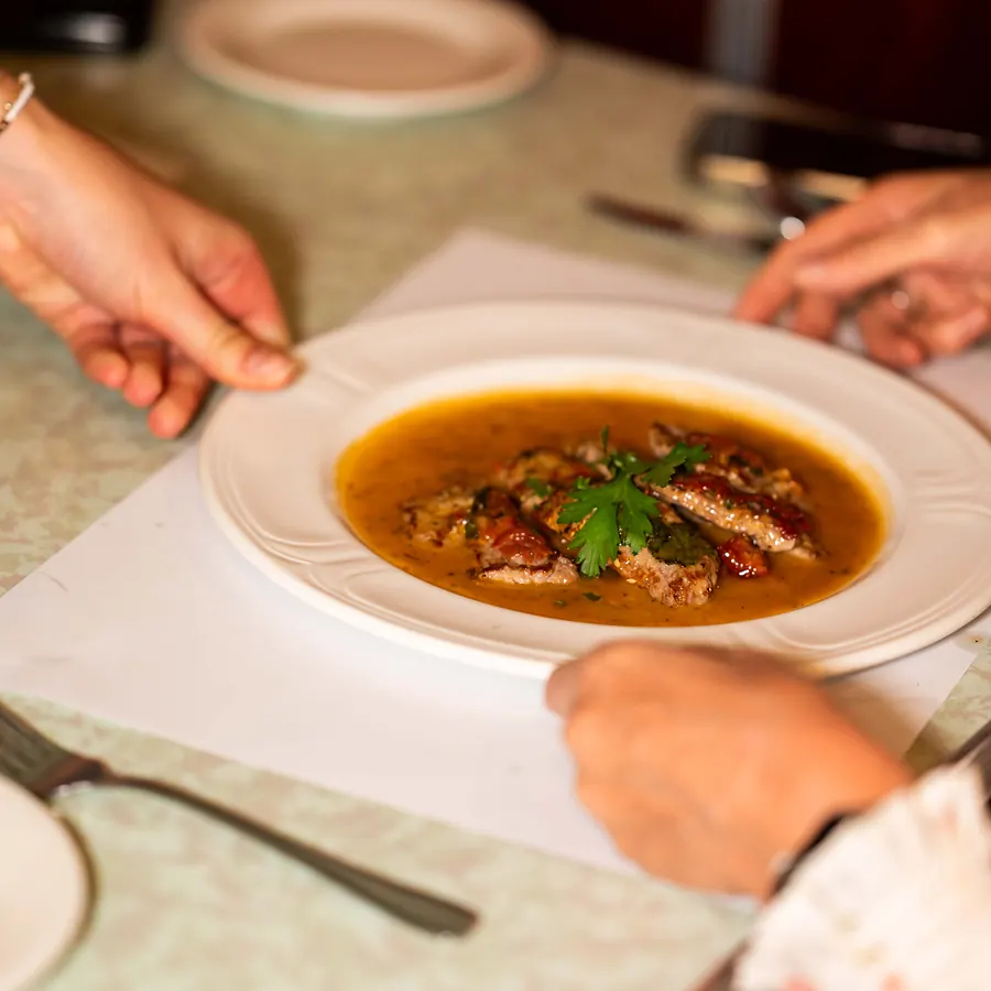 Mains being served to guests at a Grappino table
