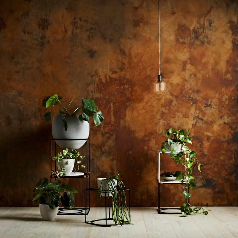 Oxidised metallic plaster finish with a rust and patina effect