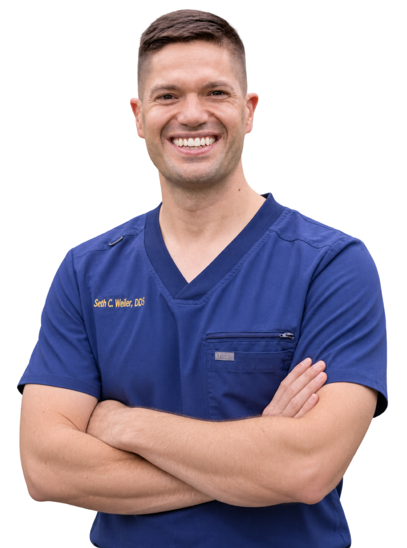 Dr. Weiler smiling with arms crossed