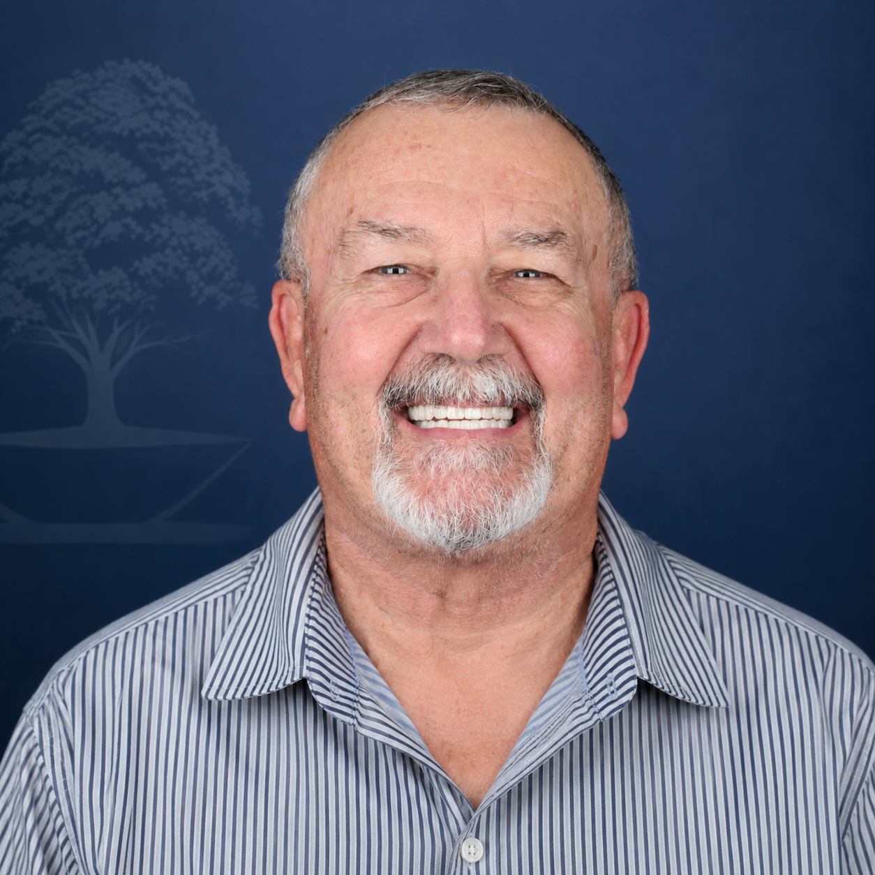 Patient with a white goatee shown before and after dental implant treatment