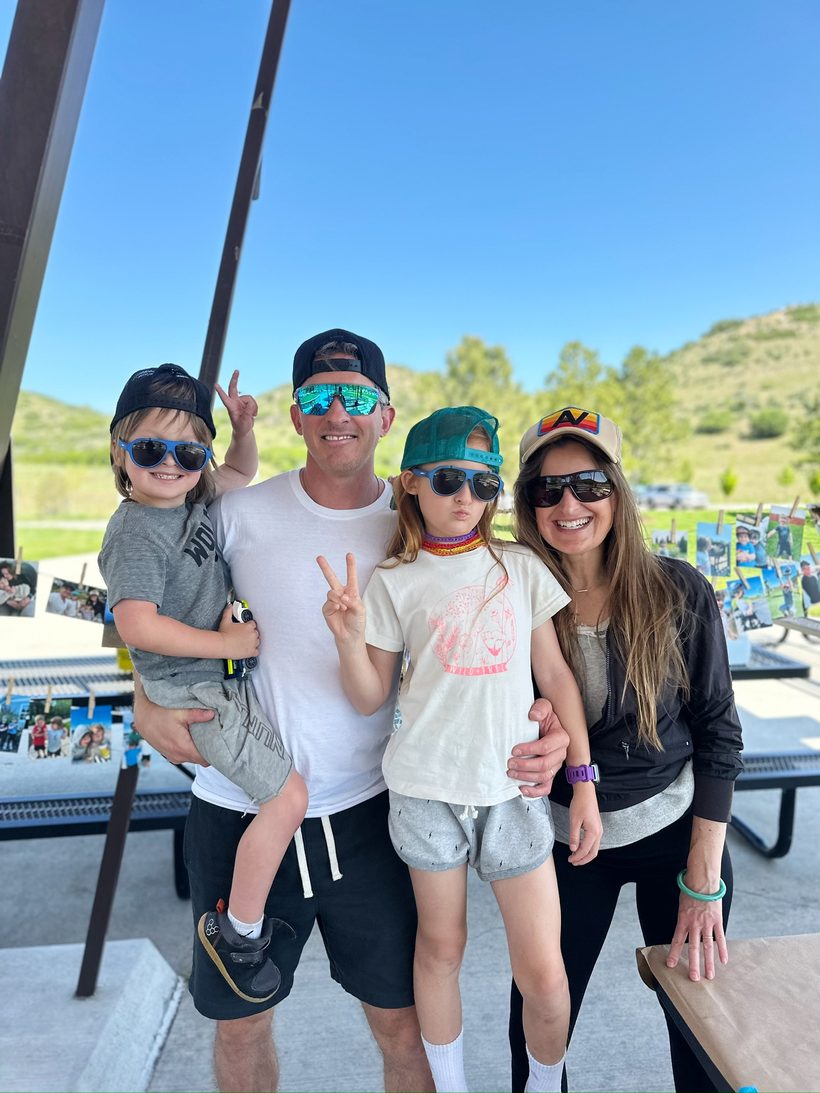 Chris with his wife and two kids