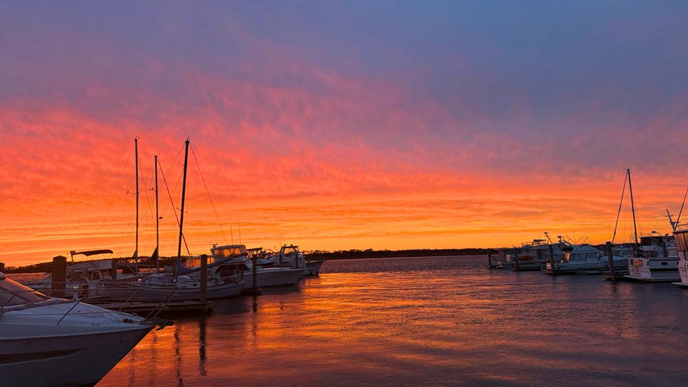 Folly Beach marsh sunset during a private sailing charter