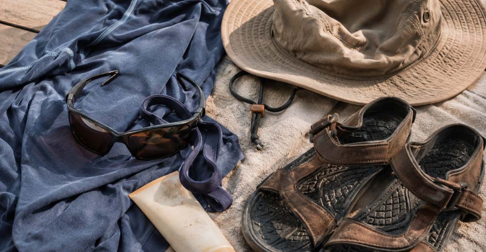 What to wear on a Folly Beach sailing charter with sun shirt hat sunglasses and sunscreen What to wear on a Folly Beach sailing charter with sun shirt hat sunglasses and sunscreen