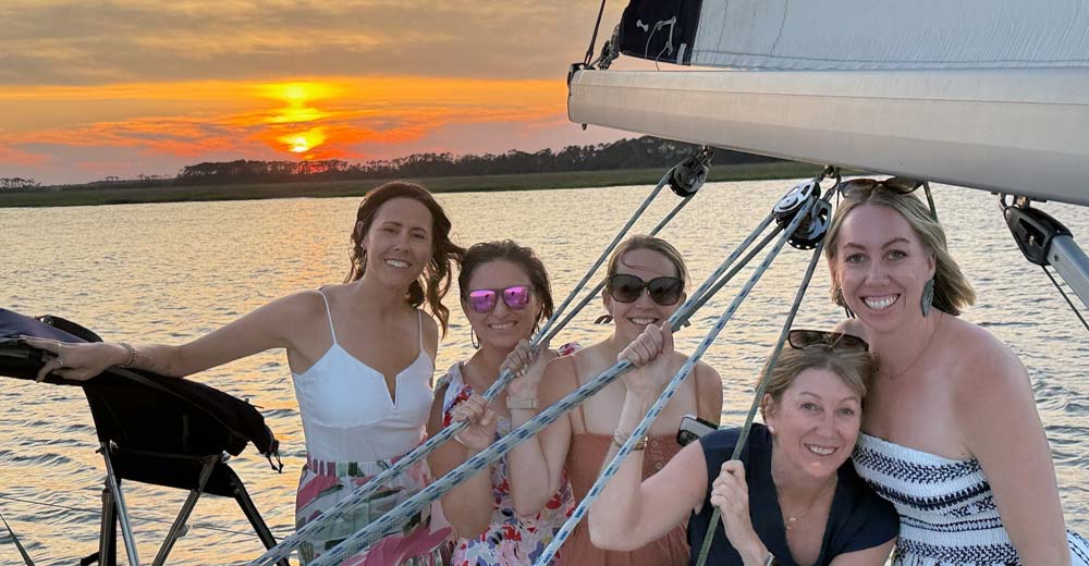 Private sunset charter in Folly Beach with warm October light and calm water Private sunset charter in Folly Beach with warm October light and calm water
