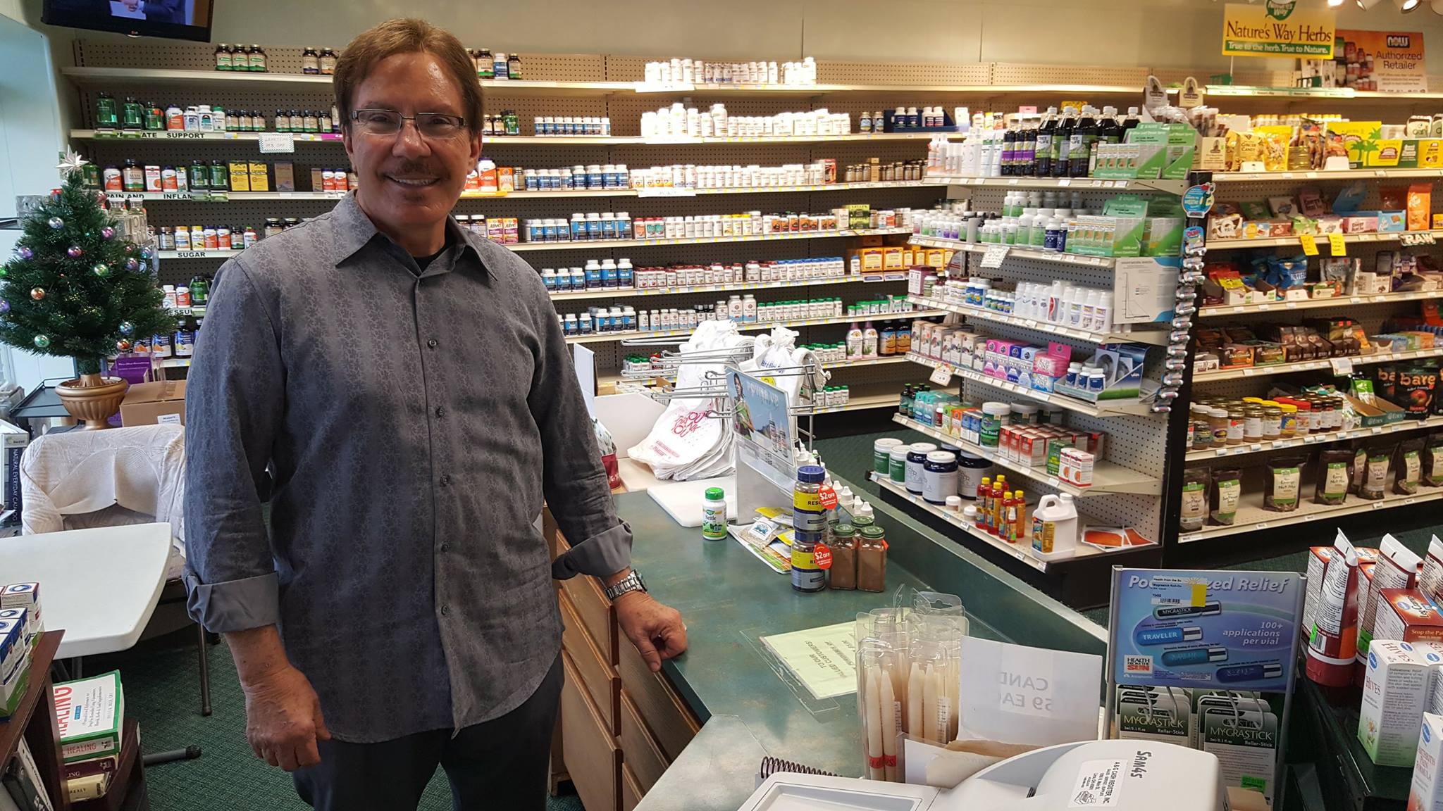 John Krech behind the Planet Health counter