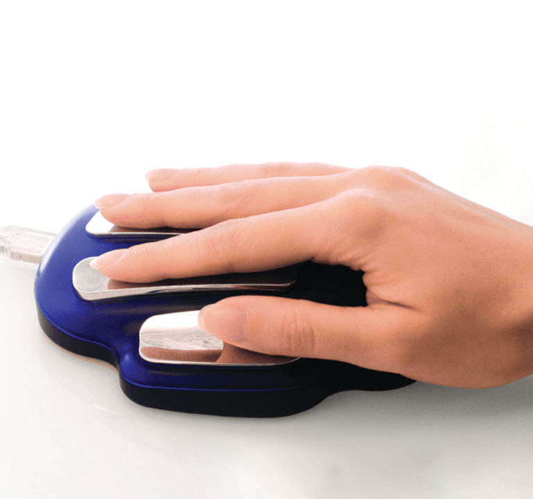 Hand resting on a wellness scanning device