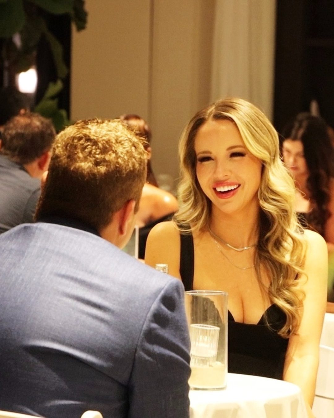 Guest laughing at event