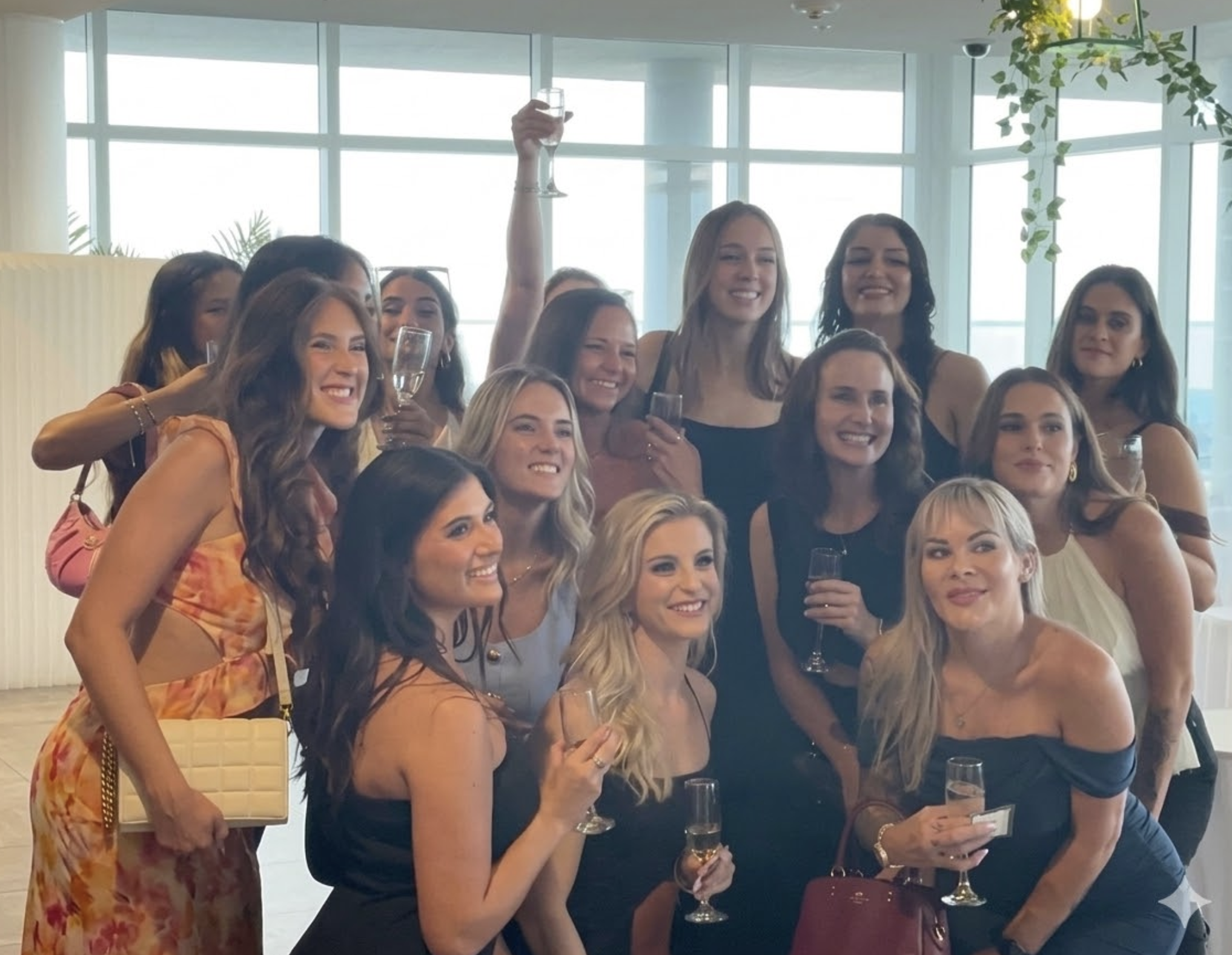 Women's power hour — women seated at tables before rotation