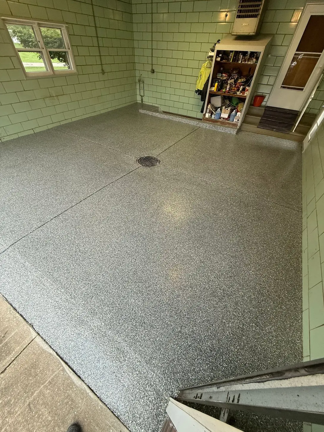 Green tile garage with epoxy flake floor in Northeast Ohio