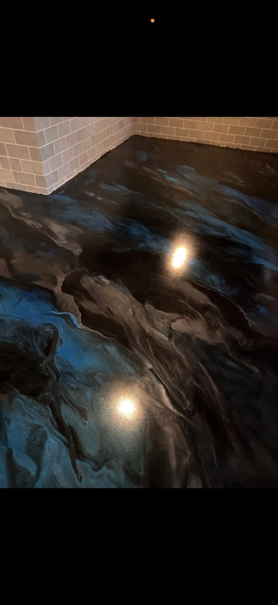 Black and blue metallic epoxy floor in Northeast Ohio