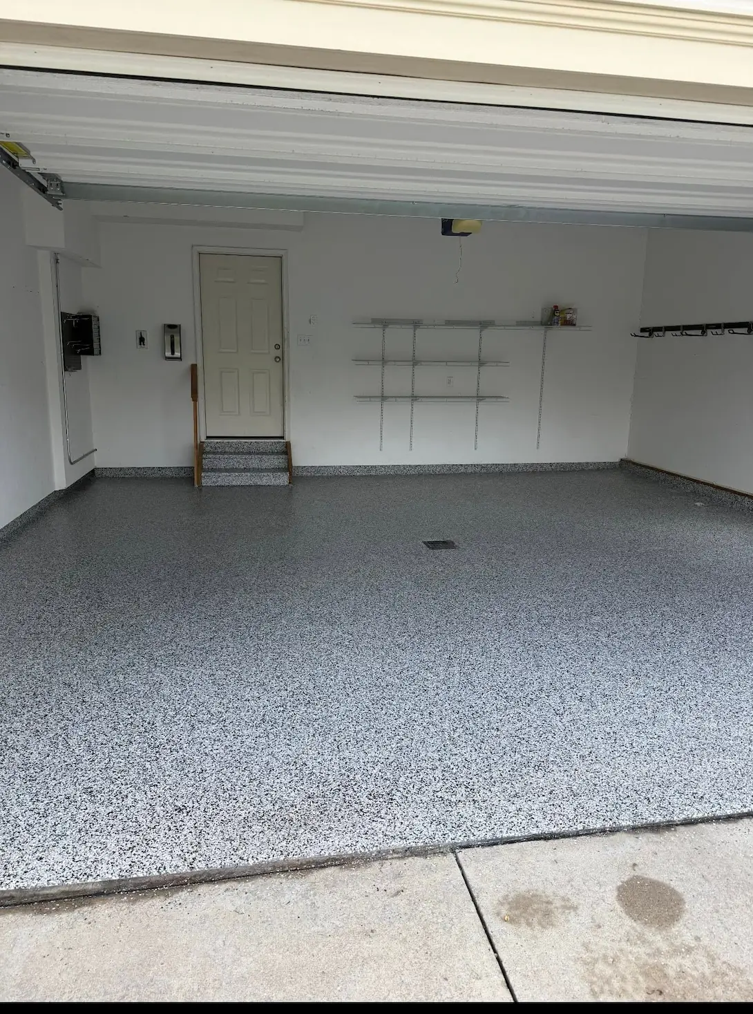 Clean epoxy flake garage floor in Northeast Ohio