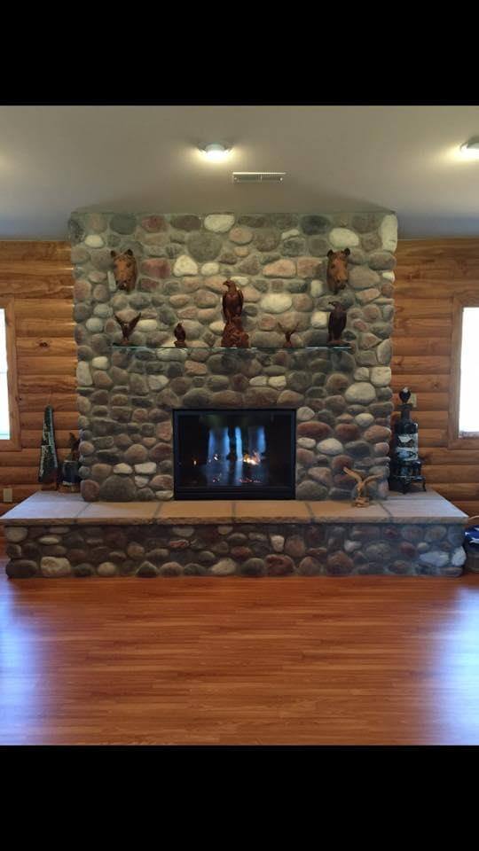 A beautifully installed custom fireplace design showcasing expert craftsmanship 16