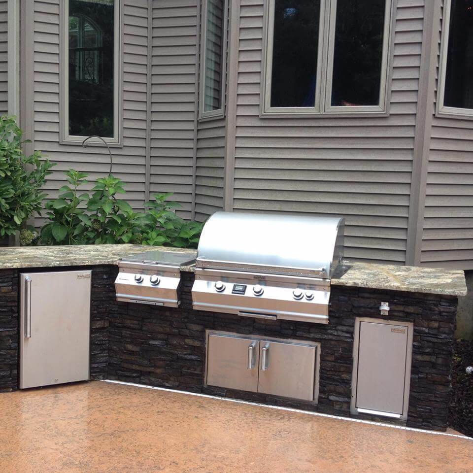 Detailed view of a custom outdoor kitchen setup seamlessly extending the home's living space