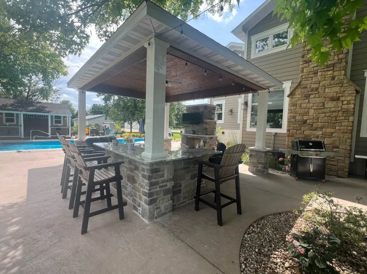 Premium pergola structure with cedar beams over a patio outdoor entertaining area