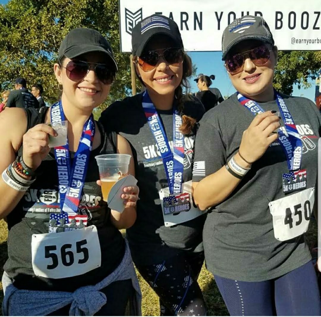 5K For Heroes race participants celebrating after the run