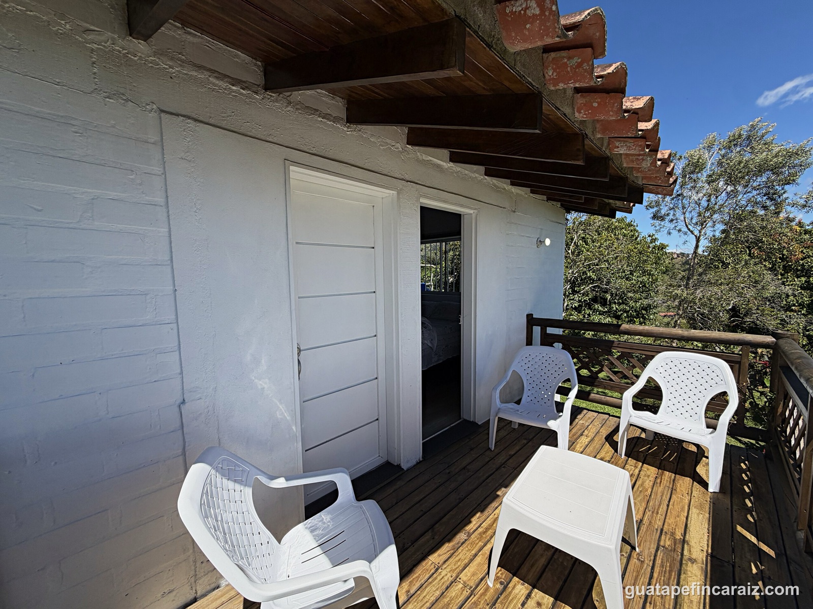 Upstairs balcony terrace off the bedroom with mountain and lake views