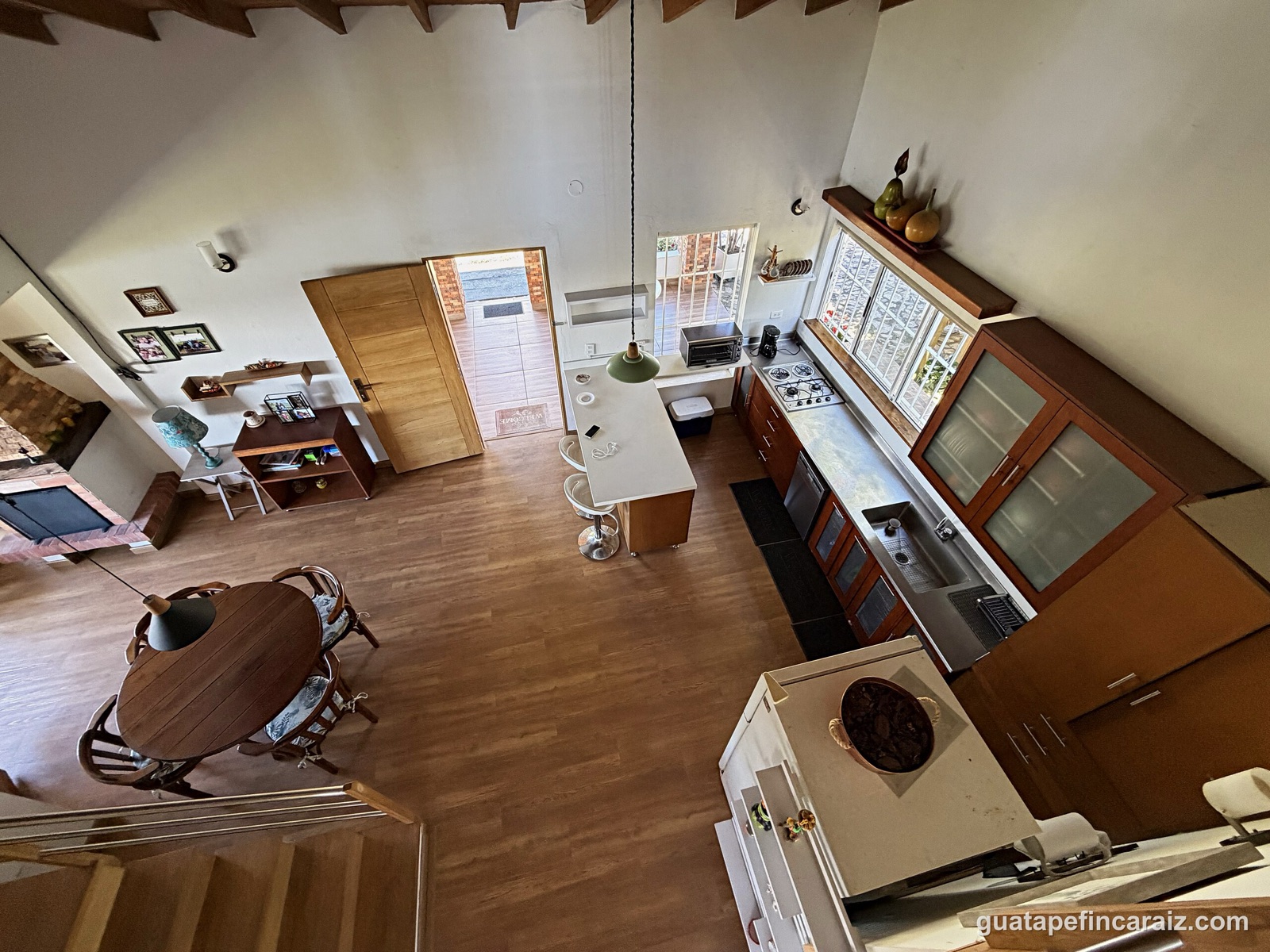 Elevated view of the kitchen and dining area from the loft