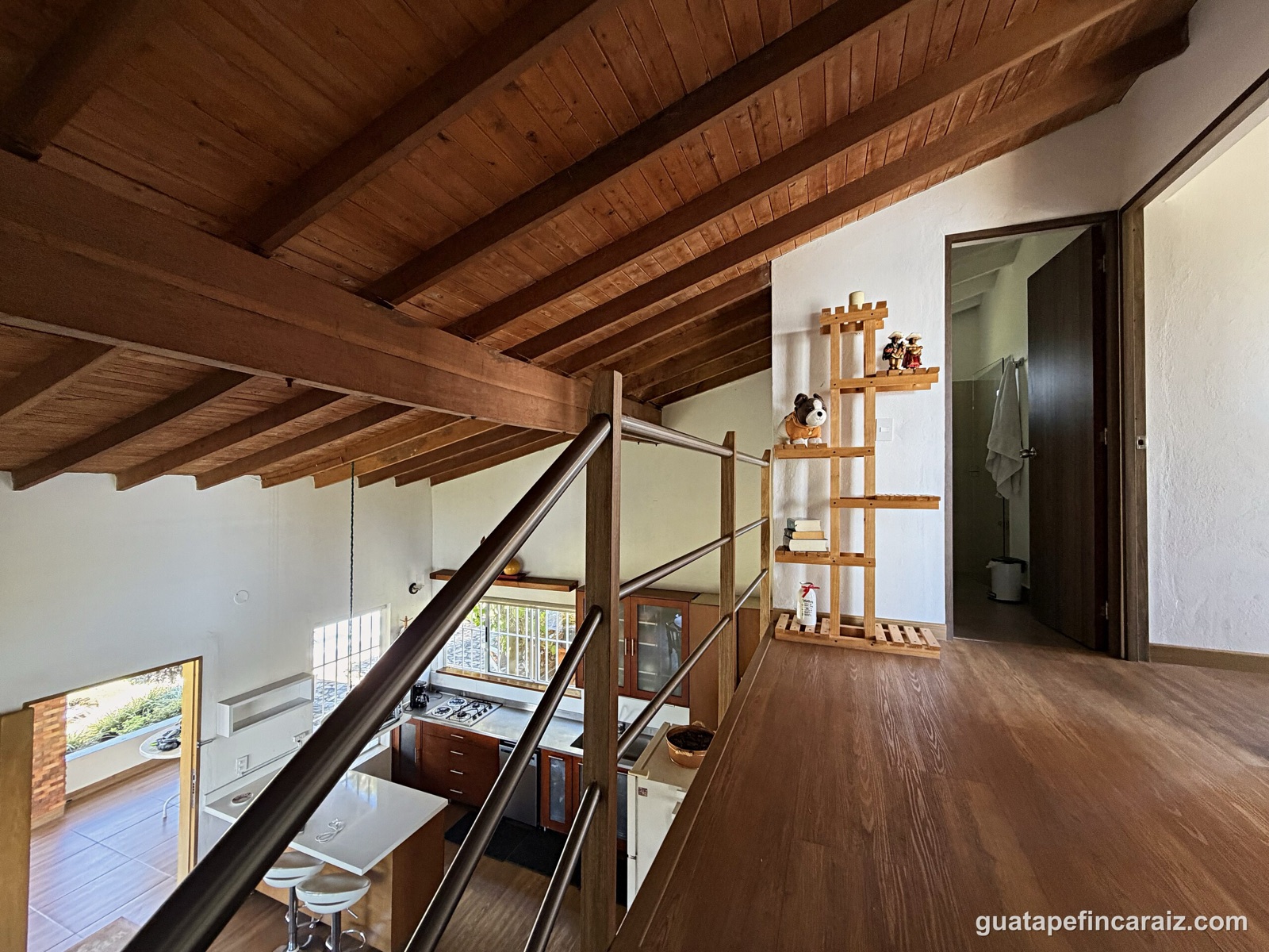 Loft landing area overlooking the kitchen below