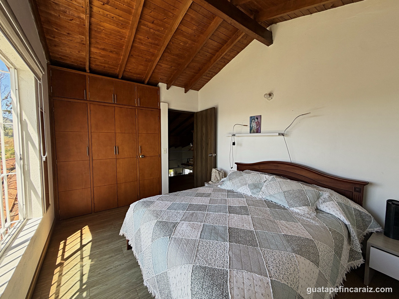Bedroom with built-in wood wardrobe