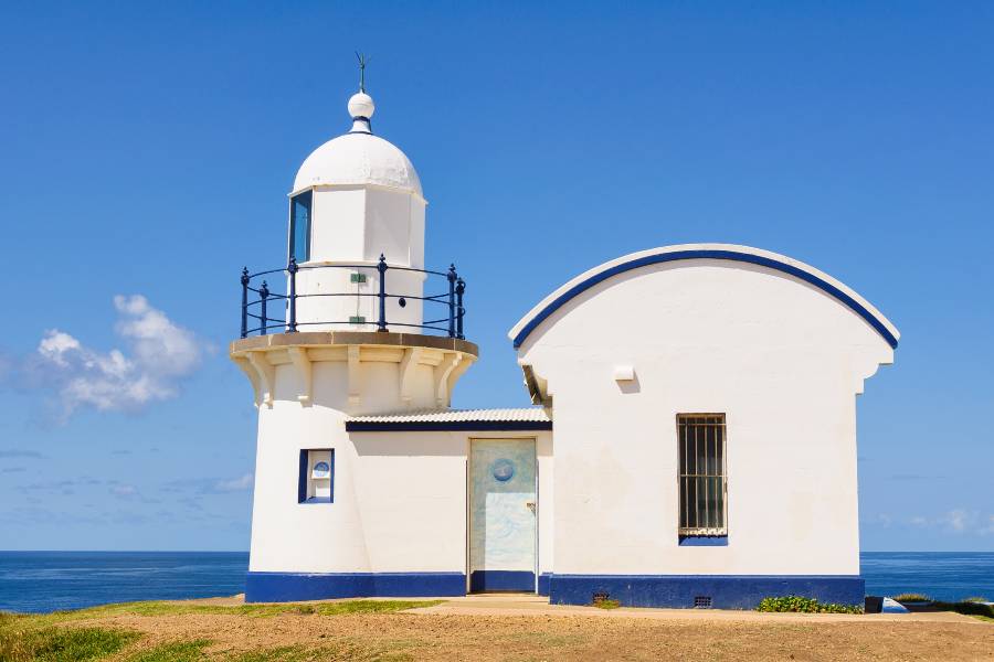 Tacking Point Lighthouse in Port Macquarie under a clear blue sky