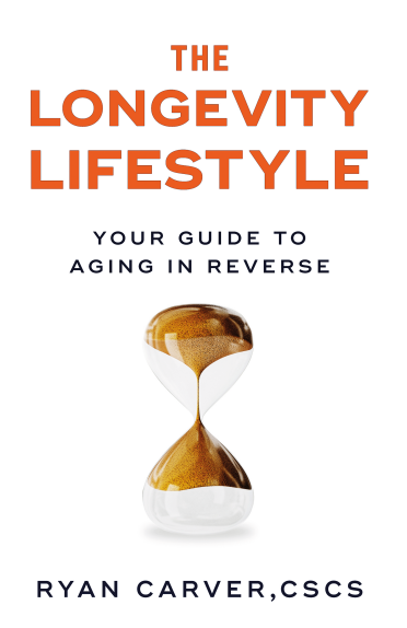 Ryan Carver holding The Longevity Lifestyle book