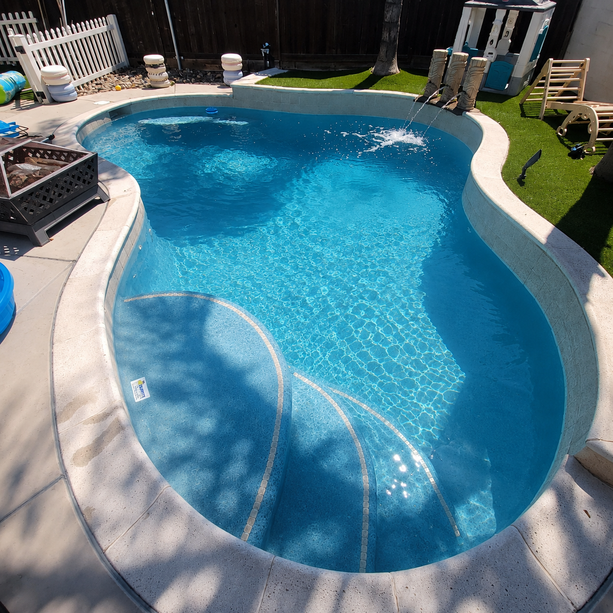 Pool pump repair in French Valley showing a pool pump motor and equipment pad