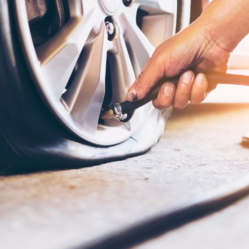 Car tire being inflated