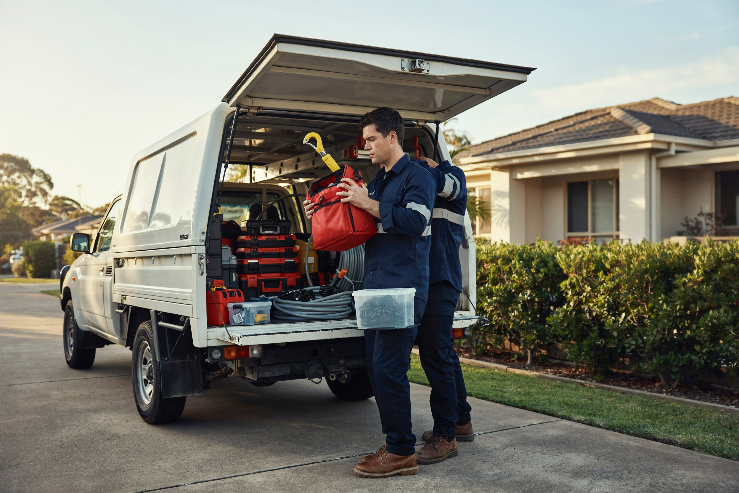Pulling the rescue kit from the ute canopy