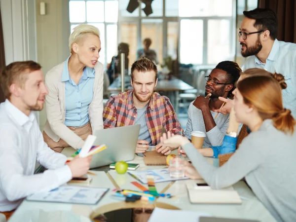 usiness professionals networking and building partnerships, symbolising collaboration with others to boost authority and online reach.