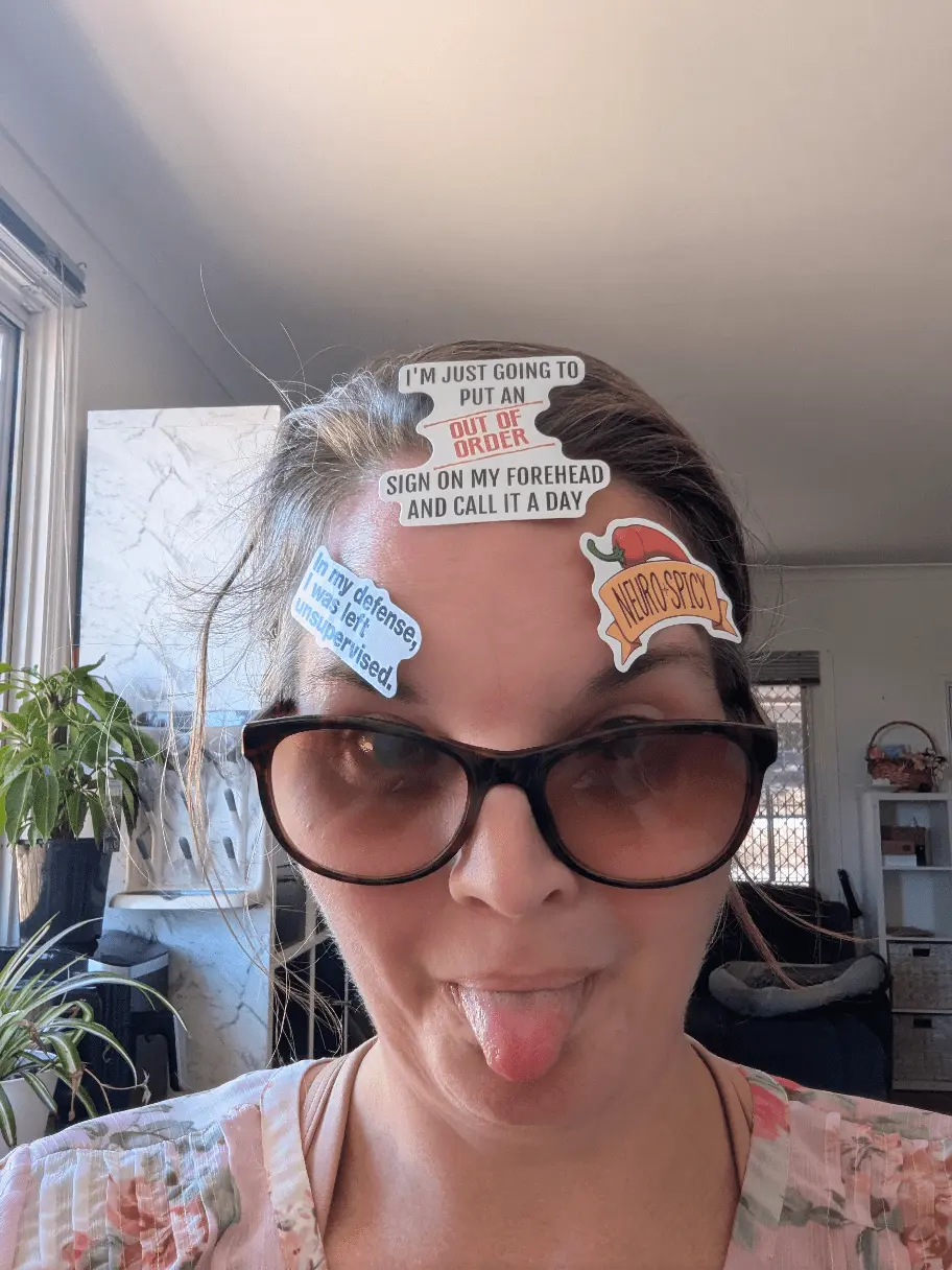 Ellie with silly stickers on her face