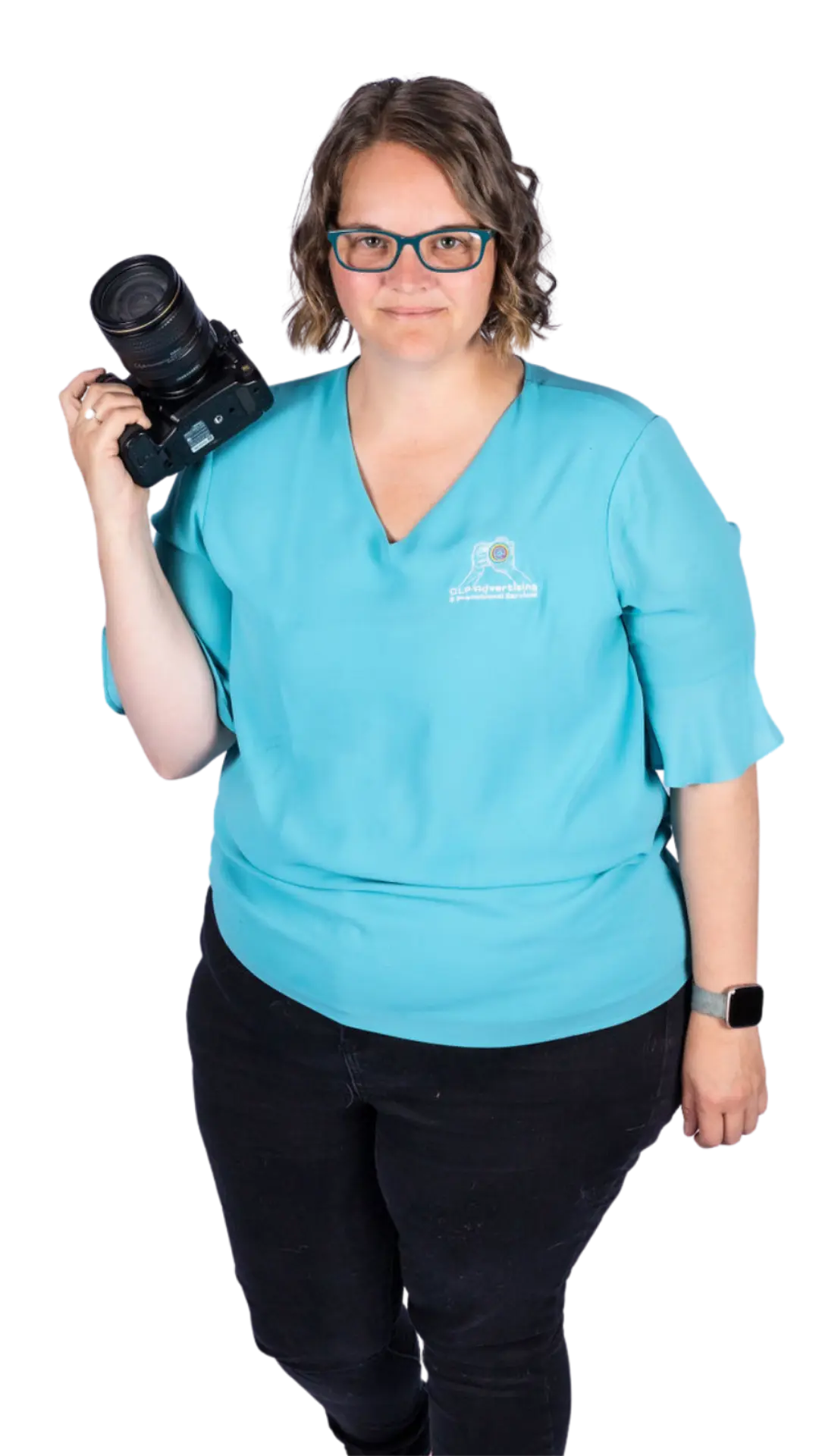 Ellie holding a camera, looking professional