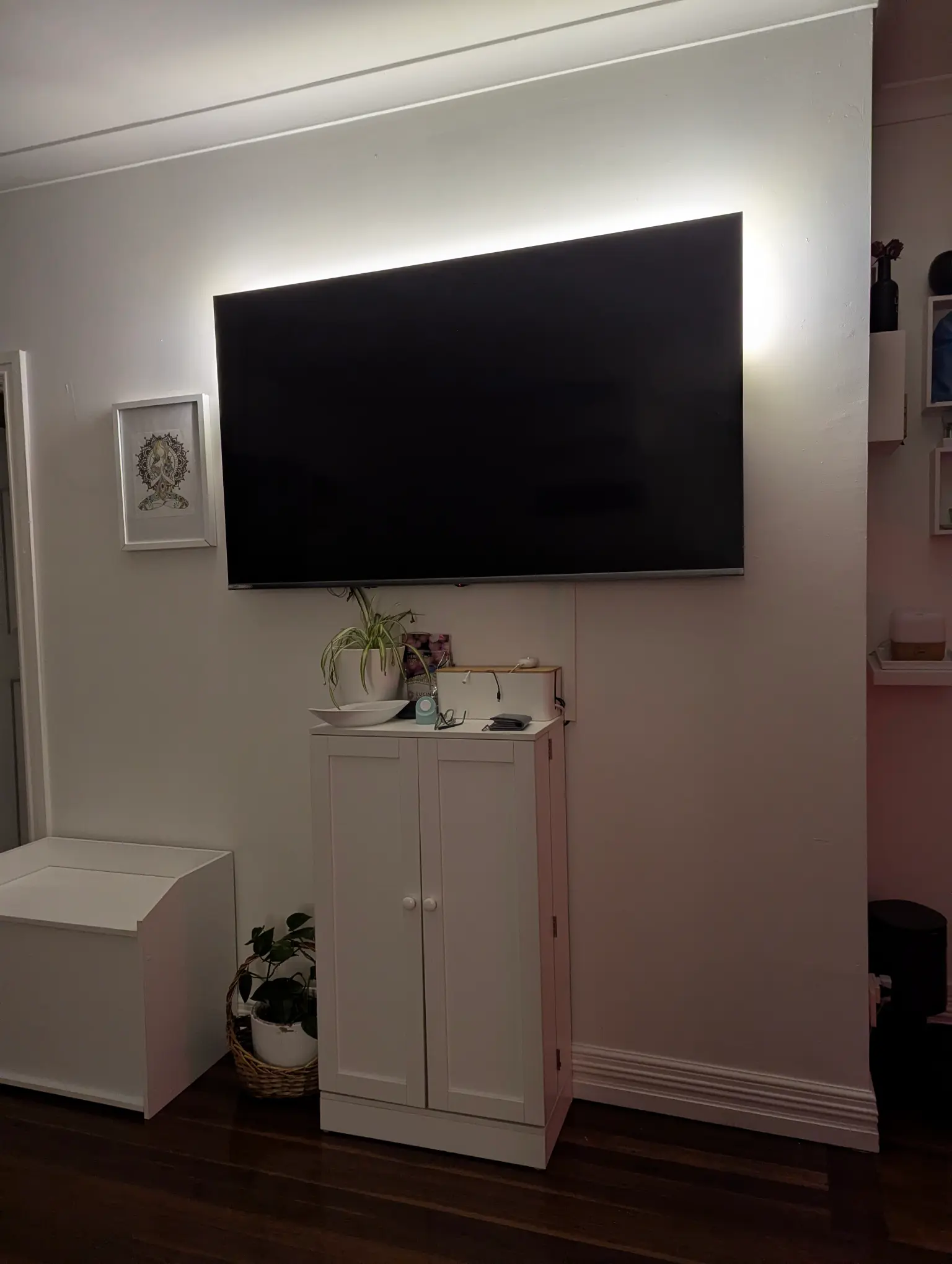 A TV glowing with soft sunset lights