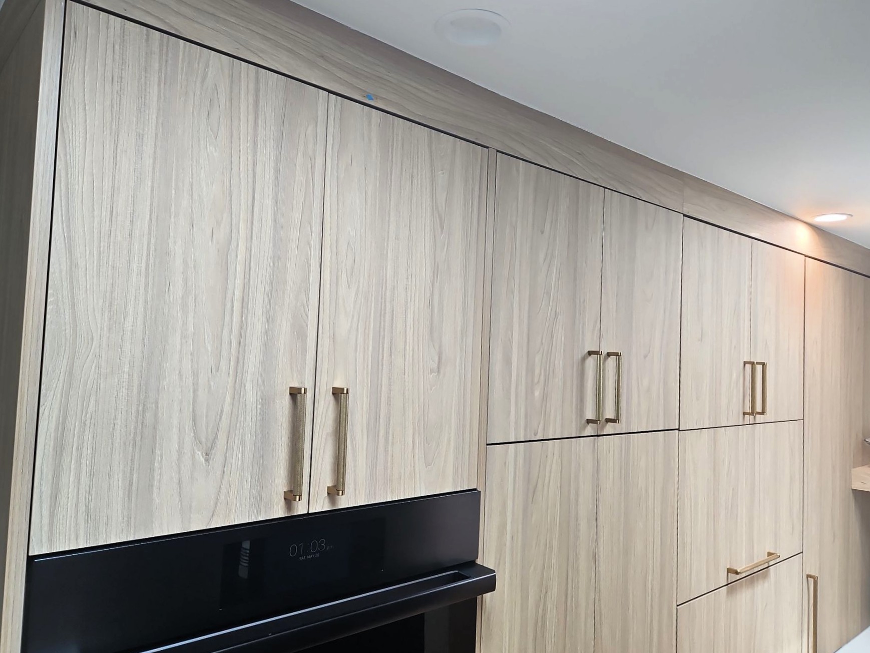 soft woodgrain textures used for custom cabinets at this Denver home
