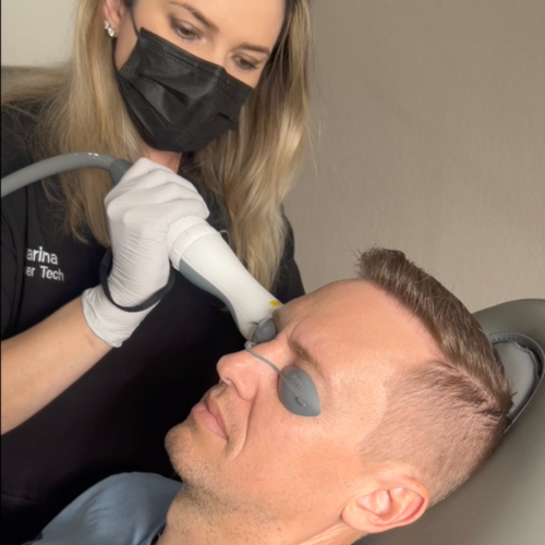 Dash Medical Spa laser specialist performing a facial laser treatment