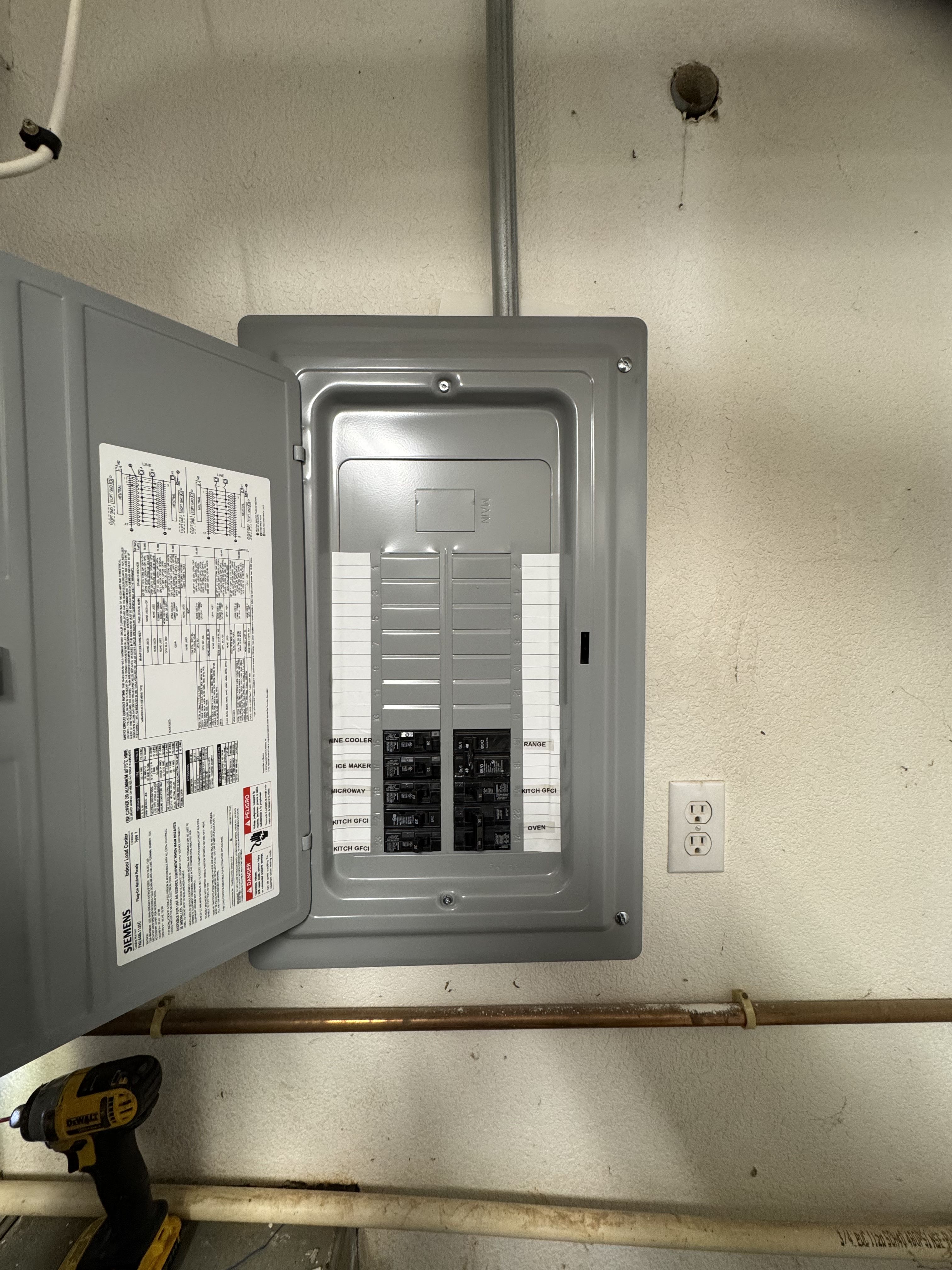 Whole-house surge protector installed at the electrical panel