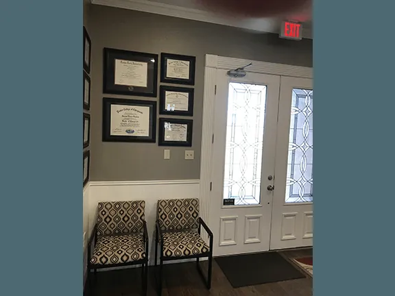 Office entry with Dr. Gordon's diplomas on the wall