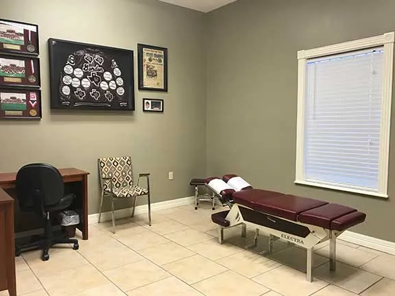 Adjustment room with treatment table
