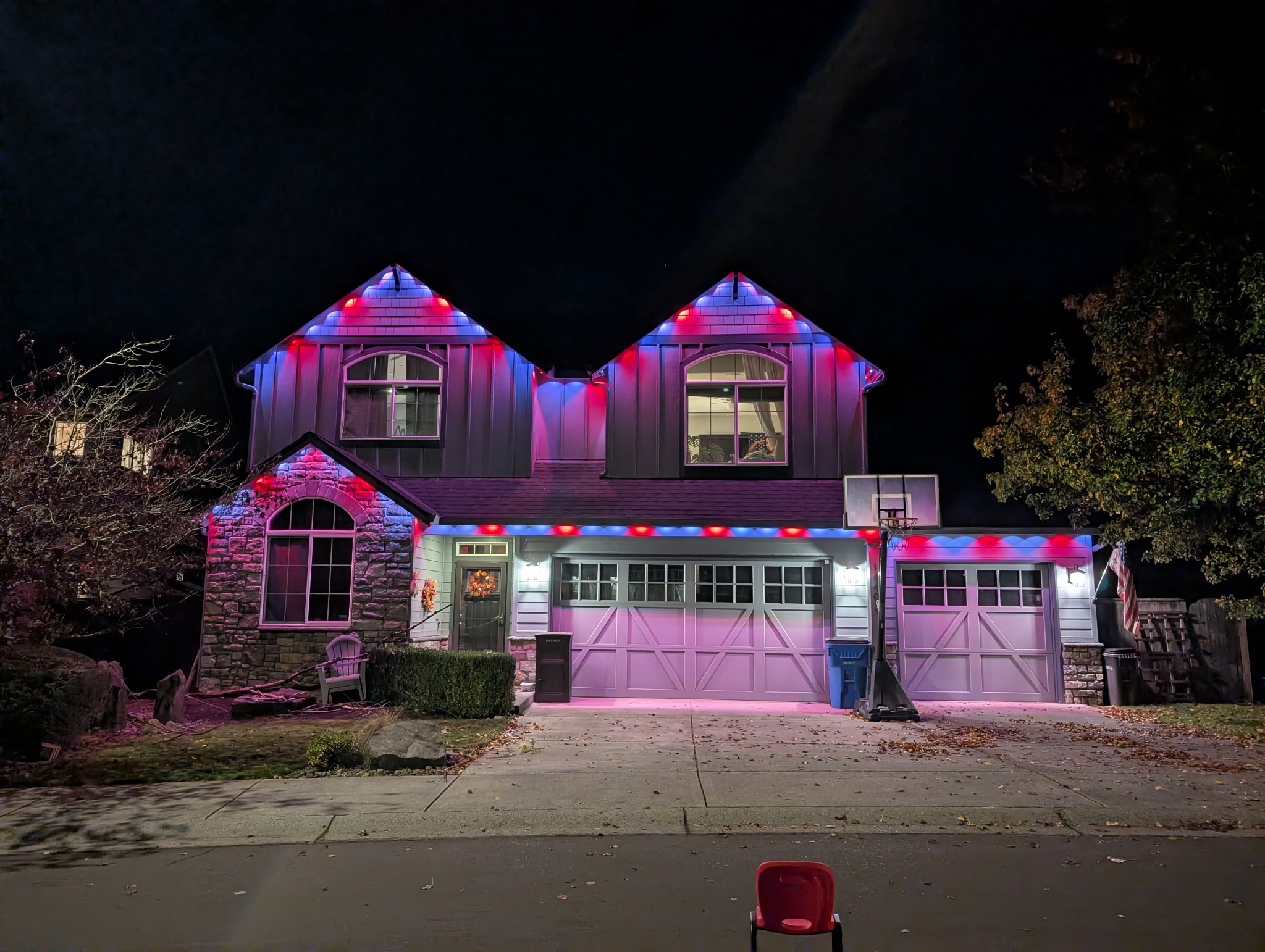 Home with permanent Govee outdoor lighting at night in Portland OR
