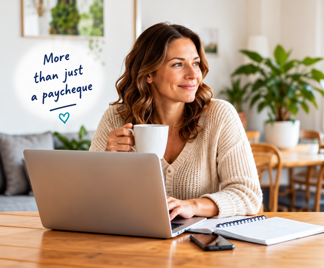 Woman at laptop with coffee, home kitchen