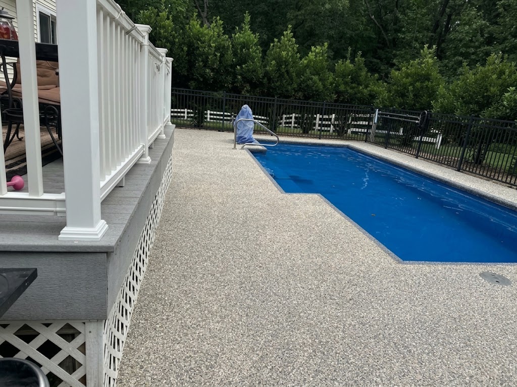 Pool deck concrete installation and resurfacing for outdoor pool areas