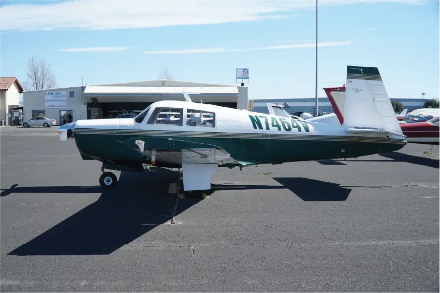 Mooney M20C - Pilot Side View
