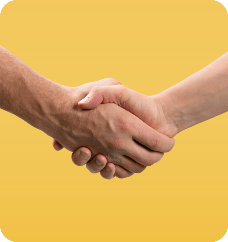 Close-up of a professional handshake on a yellow background, symbolising partnership, trust, and personalised support from Teljay Marketing.