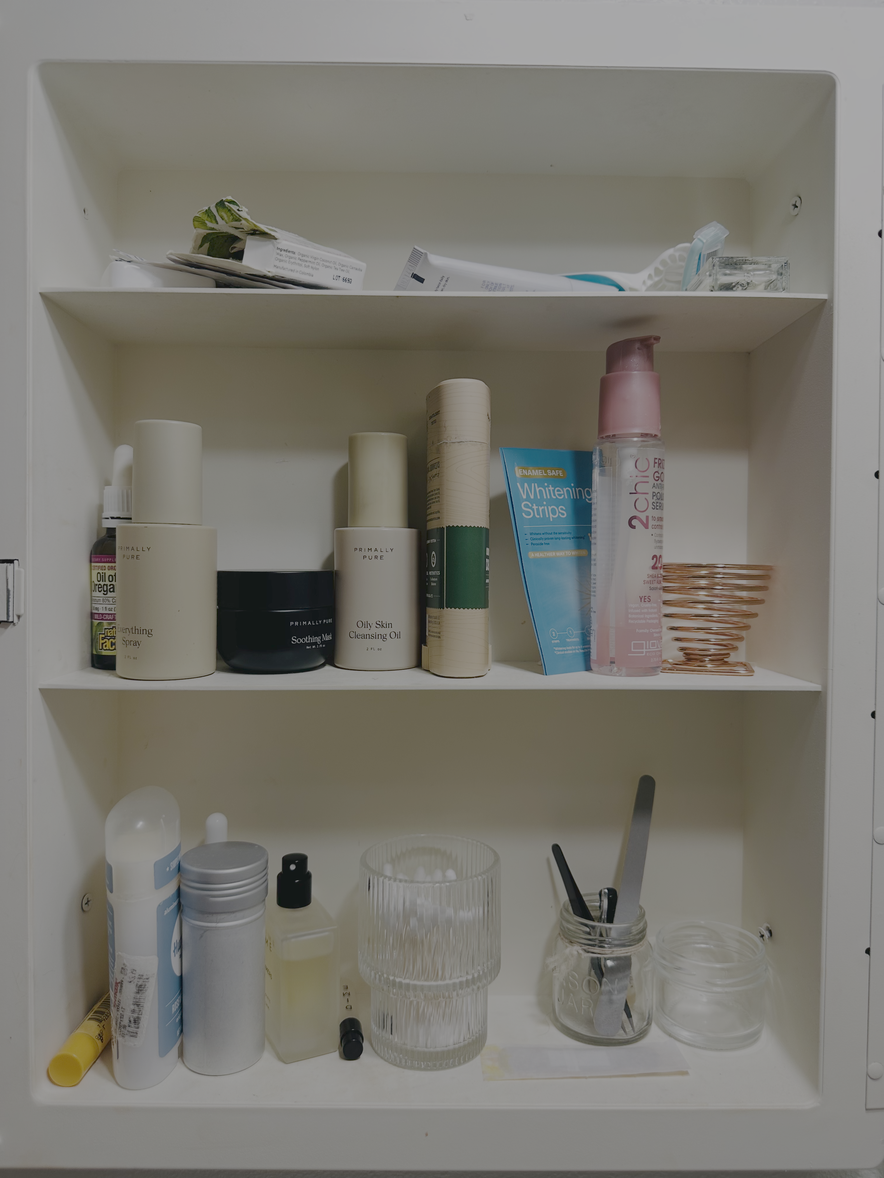 Bathroom cupboard before organizing
